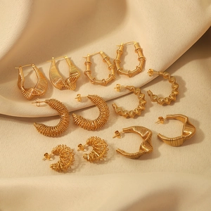 18K gold plated stainless steel earrings set with twisted textures and spiral hoop designs
