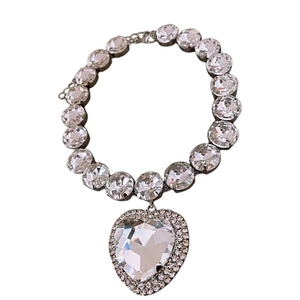 Elegant silver necklace featuring a sparkling heart pendant with radiant rhinestones