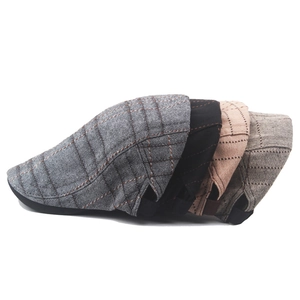 Detailed side view of plaid cotton beret hats in grey black beige and coffee colors