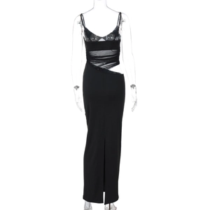 Detail view of black bodycon dress with sheer mesh panels and high side slit