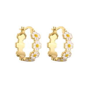 Detail of gold daisy hoop earrings with white enamel petals and yellow center