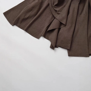 Dark brown knit coat scarf with high-density fine texture and soft drape detail