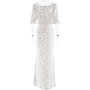 Detailed back view of white satin floral maxi dress featuring ribbon lace-up design