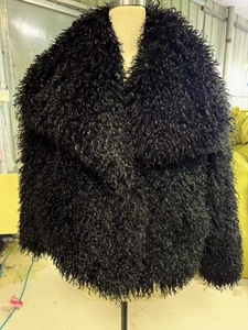 Short black faux fox fur coat with wide collar and fluffy texture for women