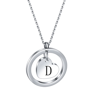 Detailed macro view of silver stainless steel heart pendant with engraved letter D