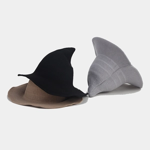 Knitted witch hats in black, grey and khaki, featuring pointed tops and wide wavy brims