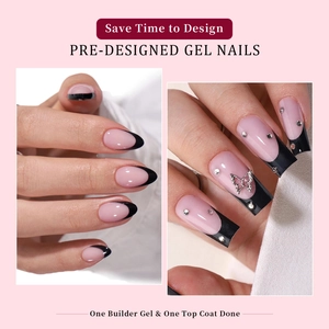 Detail of black French press-on nails with silver rhinestones and 3D butterfly accents