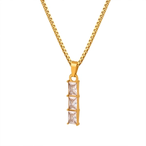 Elegant gold necklace with three vertical baguette-cut zircons on a classic box chain