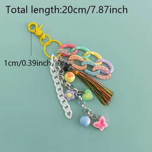 Detailed view of colorful acrylic keychain with heart charms and dimensions in inches