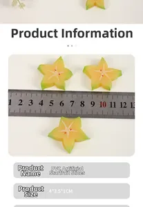 Detailed view of PVC starfruit slice model with ruler showing 4x3.5x1cm size