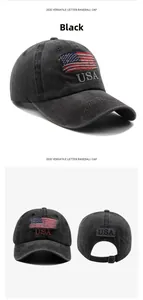 Detail of washed black cotton baseball cap with USA embroidery and metal buckle strap