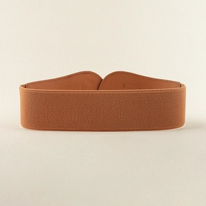 Detail of camel elastic wide belt featuring geometric faux leather wave-shaped finish
