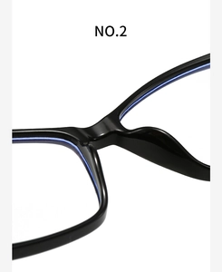 Detailed macro view of the nose pads and bridge on these vintage black frame glasses