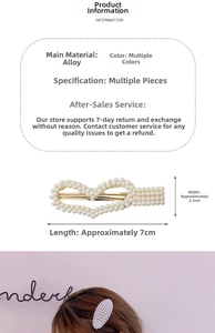 Detailed view of a heart-shaped pearl hair clip with gold alloy base and size markings