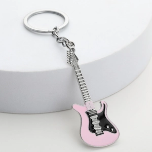 Creative electric guitar keychain featuring pink and black enamel with silver metal finish