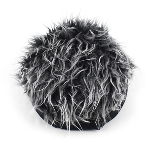 Close-up of grey and black synthetic faux fur wig cap with dense fluffy long hair texture