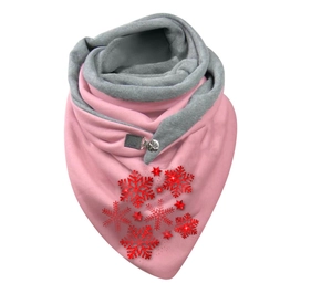 Detail of pink fleece scarf with red glitter snowflakes and a metal button closure