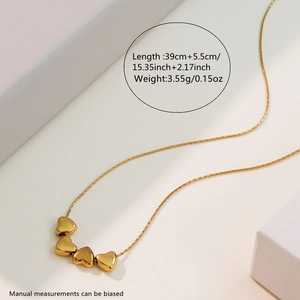Detail of 39cm gold heart pendant necklace showing lobster clasp and extender chain