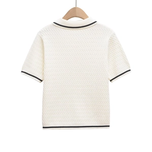 Back view of retro short-sleeved knit Polo shirt with contrast stripes on cream fabric