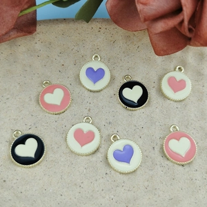 Colorful heart-shaped enamel charms with gold metal frames for DIY jewelry and necklaces