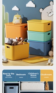 Macro detail of stackable plastic storage bins with lids and ergonomic side handles