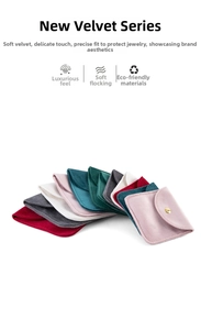 Macro detail of thick flannel jewelry pouches with metallic snap buttons in various colors