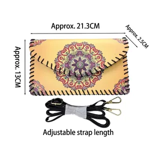 Ethnic yellow crossbody bag with mandala print, adjustable strap and handmade stitching