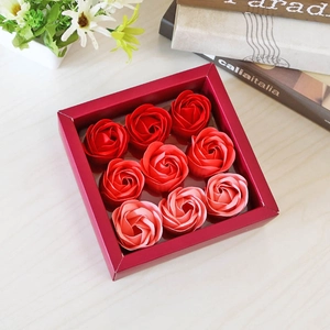 Macro shot of 9 gradient red soap roses in a gift box for Valentine's Day decor