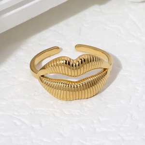 Minimalist 18K gold plated stainless steel open ring with 3D lip design on white background