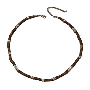 Bohemian retro beaded necklace with turquoise and dark brown wooden beads on white surface