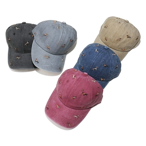 Vintage washed cotton baseball caps with all-over dog embroidery in five various colors