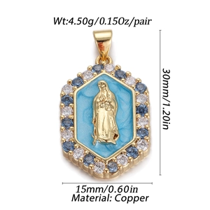 Detailed view of Virgin Mary charm with blue enamel and zircon, 30mm x 15mm copper pendant