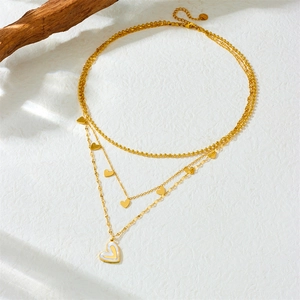 Gold layered heart necklace with white shell pendant and ball chain for women