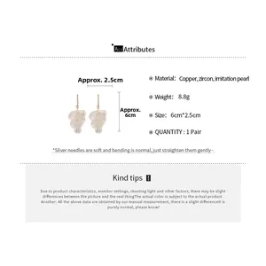 Détails des boucles d'oreilles perles pétales avec dimensions et matériaux en cuivre