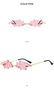 Lunettes de soleil chauve-souris sans monture avec verres roses et monture dorée