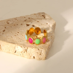 Detailed macro shot of 18K gold-plated ring with colorful oval enamel inlays