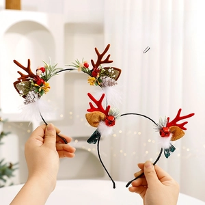 Christmas reindeer antler headband set with pine cones and bells for holiday hair styling
