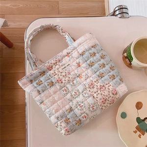 Quilted cotton floral bag with 'simple wish' label shown in a lifestyle scene setting