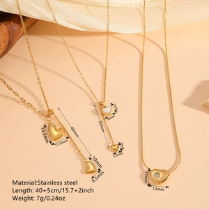 Three 18k gold plated heart pendant necklaces in stainless steel with tassel details