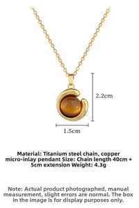 Detail showing titanium steel gold necklace with amber gemstone and dimensions info