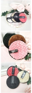 Detailed close-up of colorful microfiber cleansing sponges with CLEAN SPONGE handles