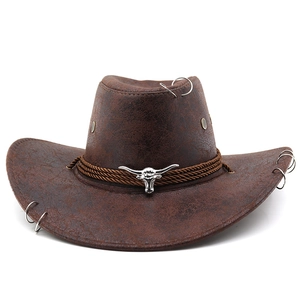 Distressed dark brown western cowboy hat with metal bull head logo and silver rings