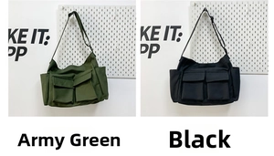 Close-up of canvas messenger bags in army green and black with utility pockets