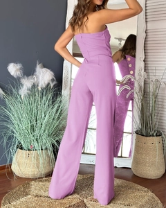 Rear view of lavender strapless wide-leg jumpsuit with decorative buttons and backless detail