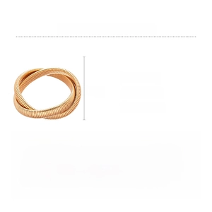 Detail showing iron multi-layered gold bracelet with coiled texture and dimensions