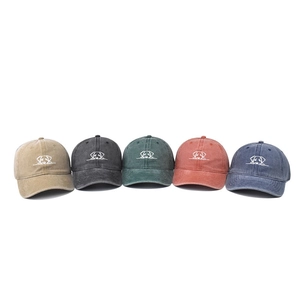 Set of five vintage washed cotton baseball caps with embroidered dog designs