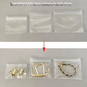 Three sizes of clear PVC jewelry storage bags showing earrings and bracelets inside