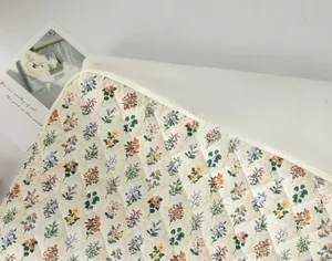 Close-up of quilted floral tablet sleeve with high-capacity storage and zip closure
