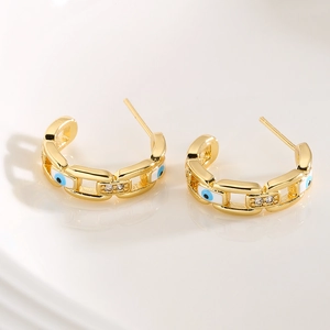 Vergoldete Kettenohrringe mit blauen Evil Eye-Motiven und funkelnden Zirkonia-Steinen
