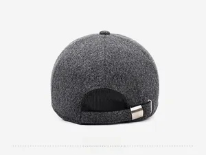 Detailed back view of grey wool baseball cap with adjustable elastic strap and metal buckle